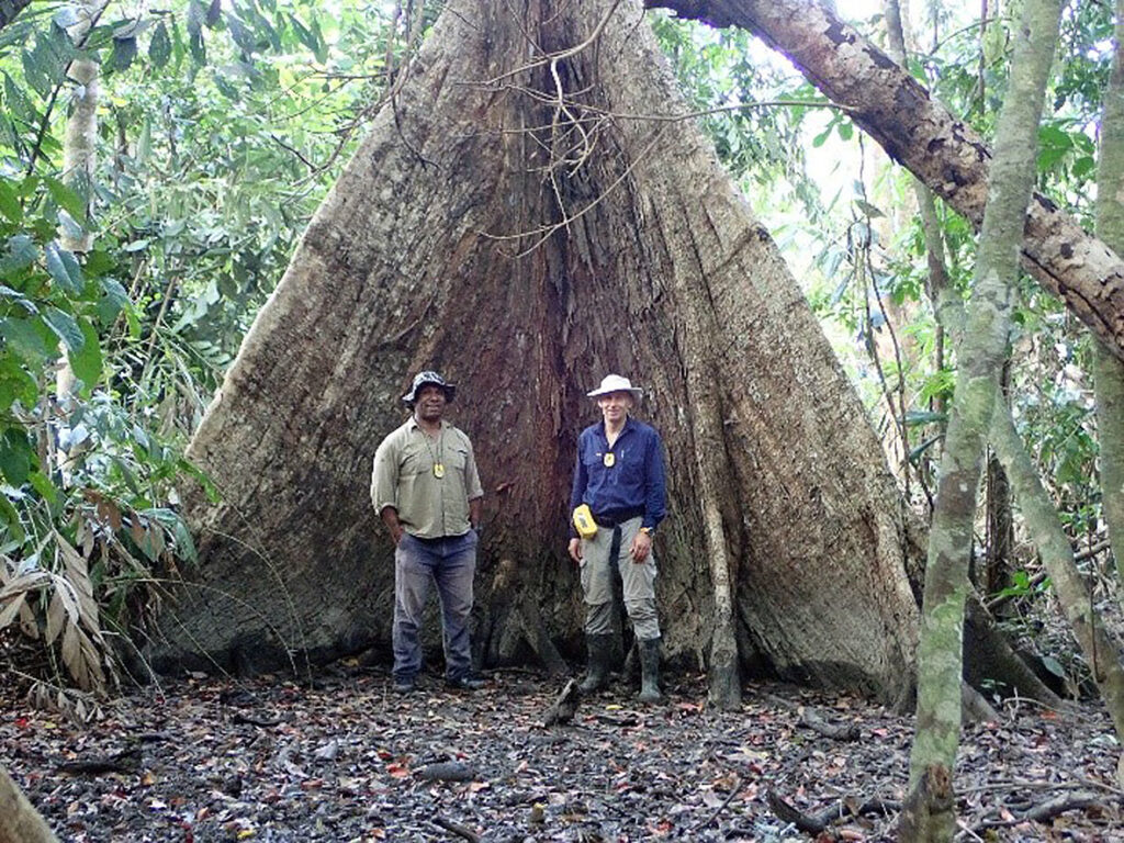 Benjamin Kelambua, botanist, and Howard Rogers in lower Fly non-impact area
